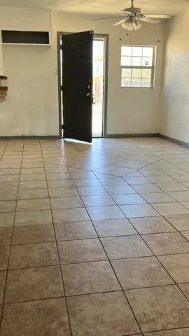 a view of a backyard of the house