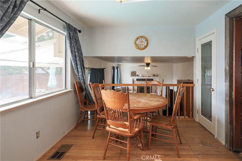 308 Harbor Drive Atwater, CA 95301 - Photo 16 of 58 a view of a dining room with furniture window and wooden floor