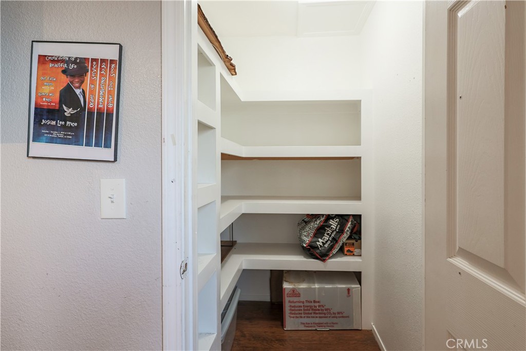 308 Harbor Drive Atwater, CA 95301 - Photo 24 of 58 a bedroom with a bed and a painting on the wall
