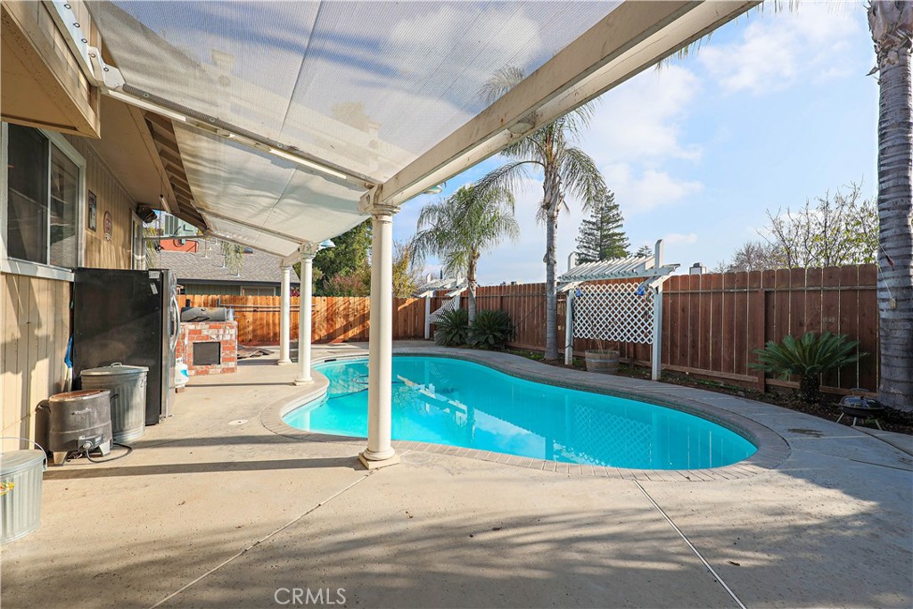 308 Harbor Drive Atwater, CA 95301 - Photo 46 of 58 a view of a house with a swimming pool