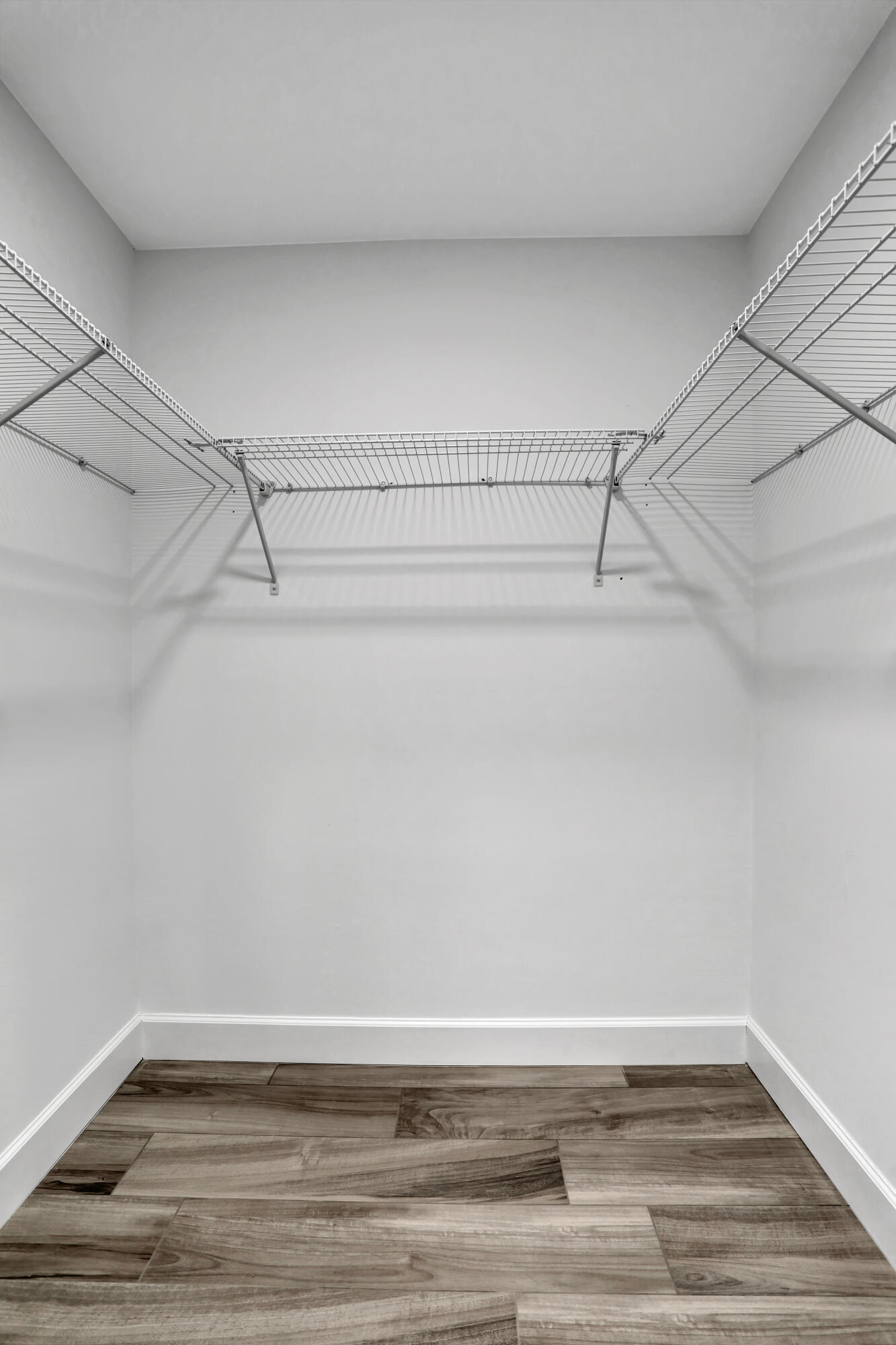 23271 Water Circle Boca Raton, FL 33486 - Photo 14 of 64 a view of a room with racks on the wall