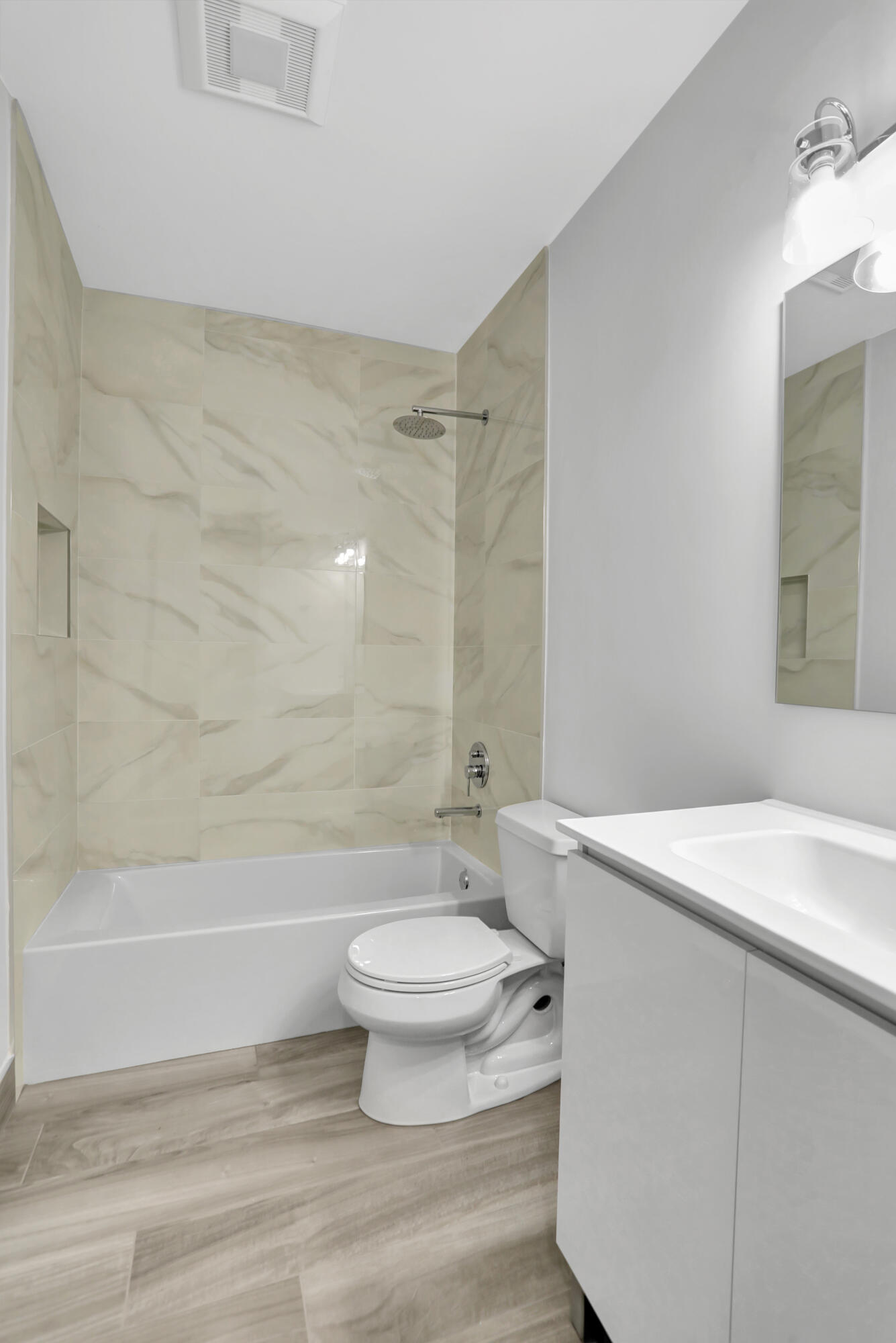 23271 Water Circle Boca Raton, FL 33486 - Photo 19 of 64 a bathroom with a sink a toilet and shower