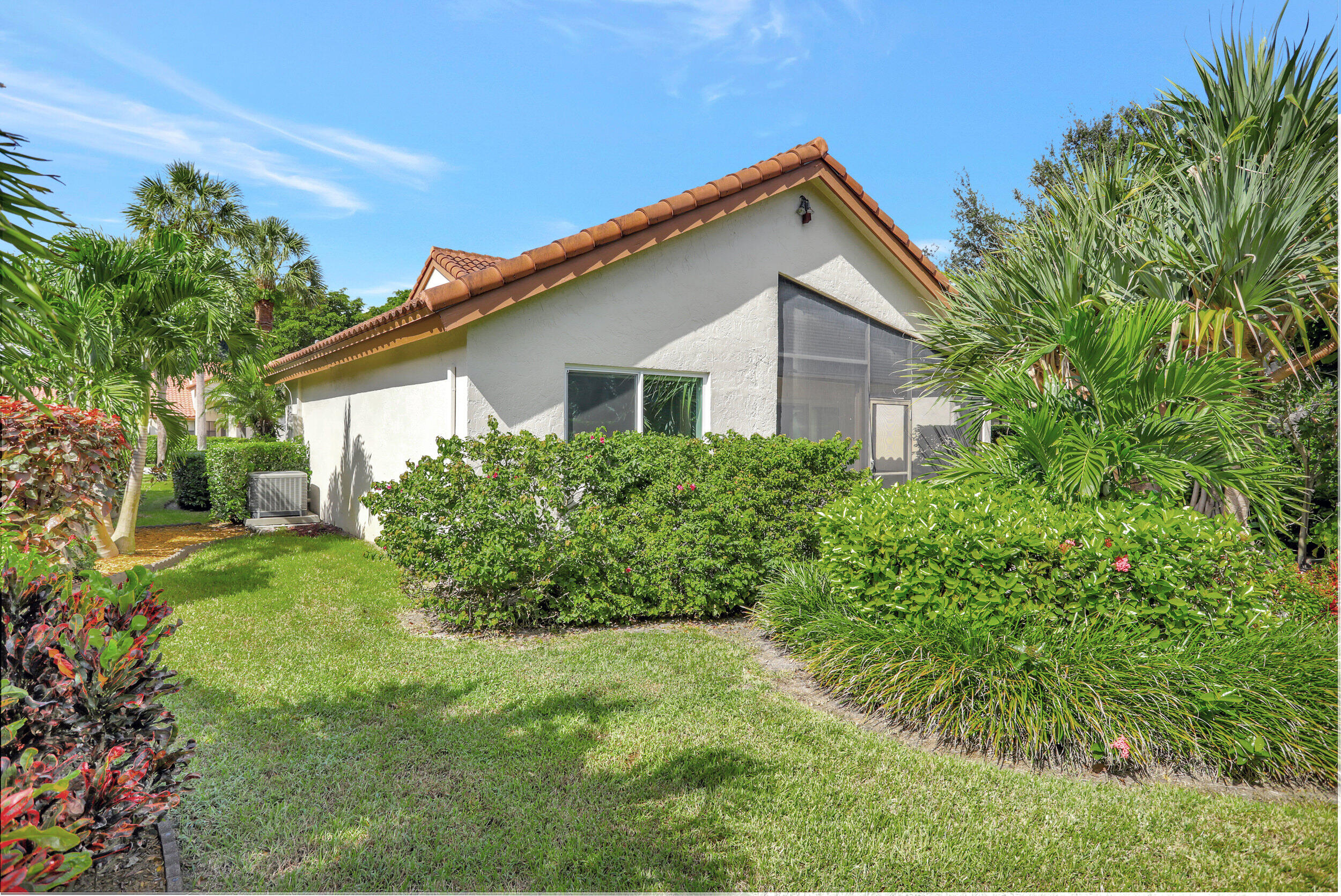 23271 Water Circle Boca Raton, FL 33486 - Photo 31 of 64 a view of a house with yard and a garden