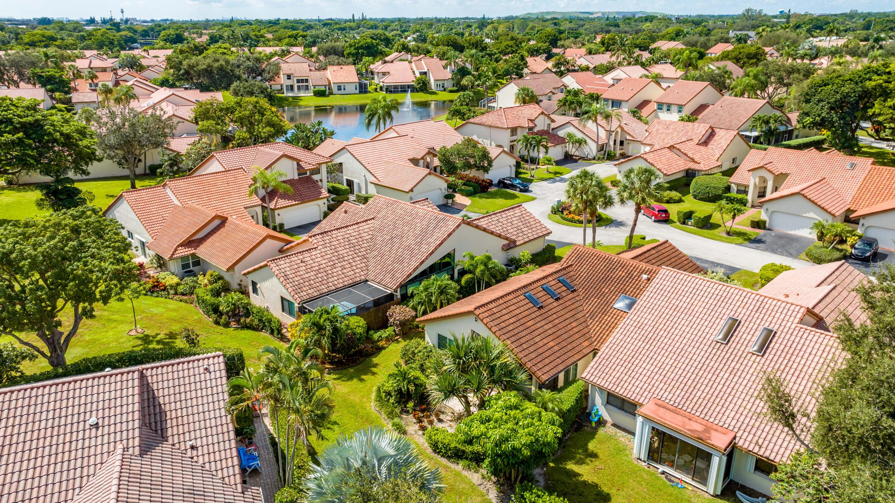 23271 Water Circle Boca Raton, FL 33486 - Photo 38 of 64 an aerial view of a house with a lake view