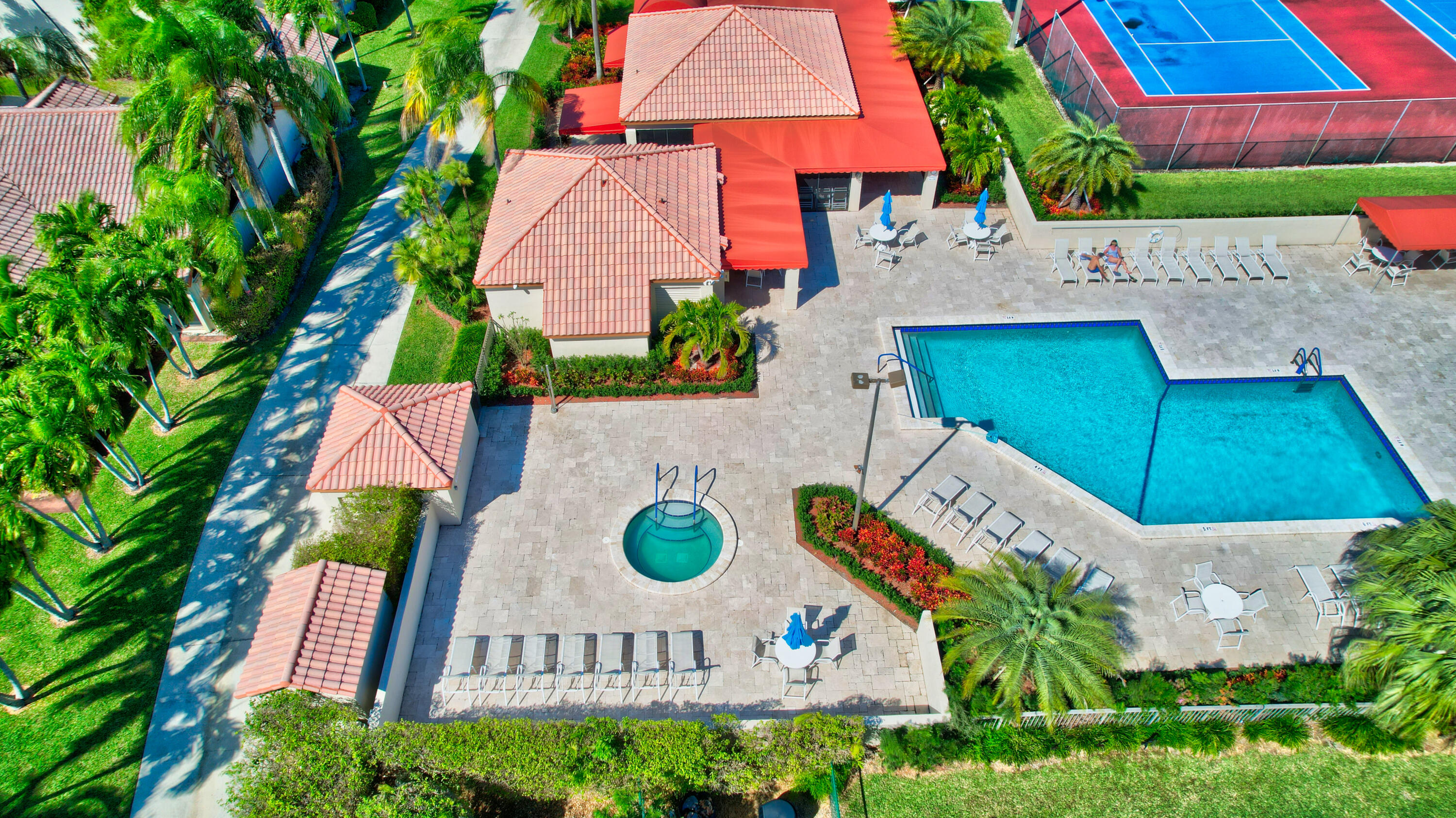 23271 Water Circle Boca Raton, FL 33486 - Photo 53 of 64 an aerial view of a house with swimming pool and patio