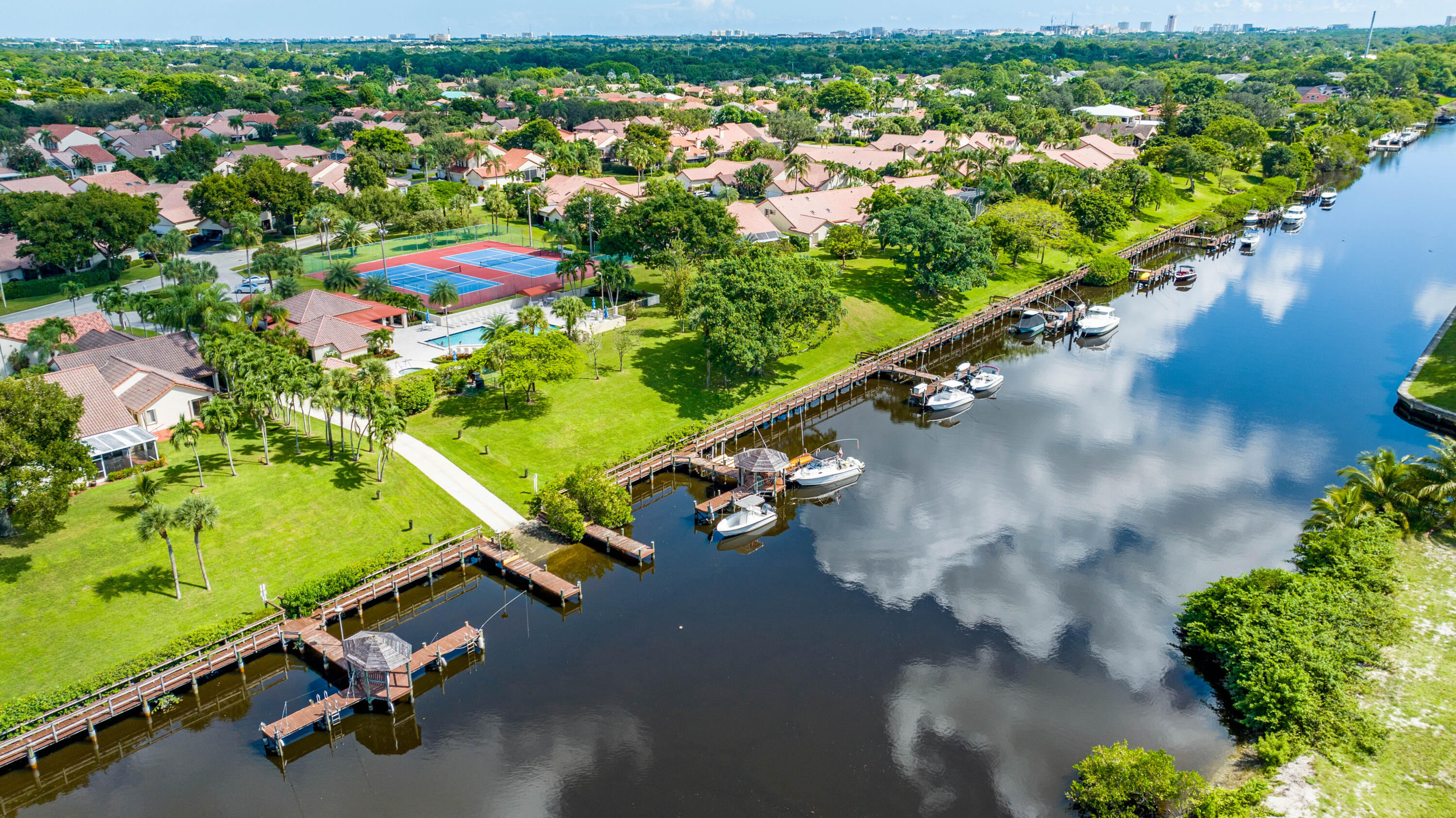 23271 Water Circle Boca Raton, FL 33486 - Photo 56 of 64 an aerial view of a golf course with parking space