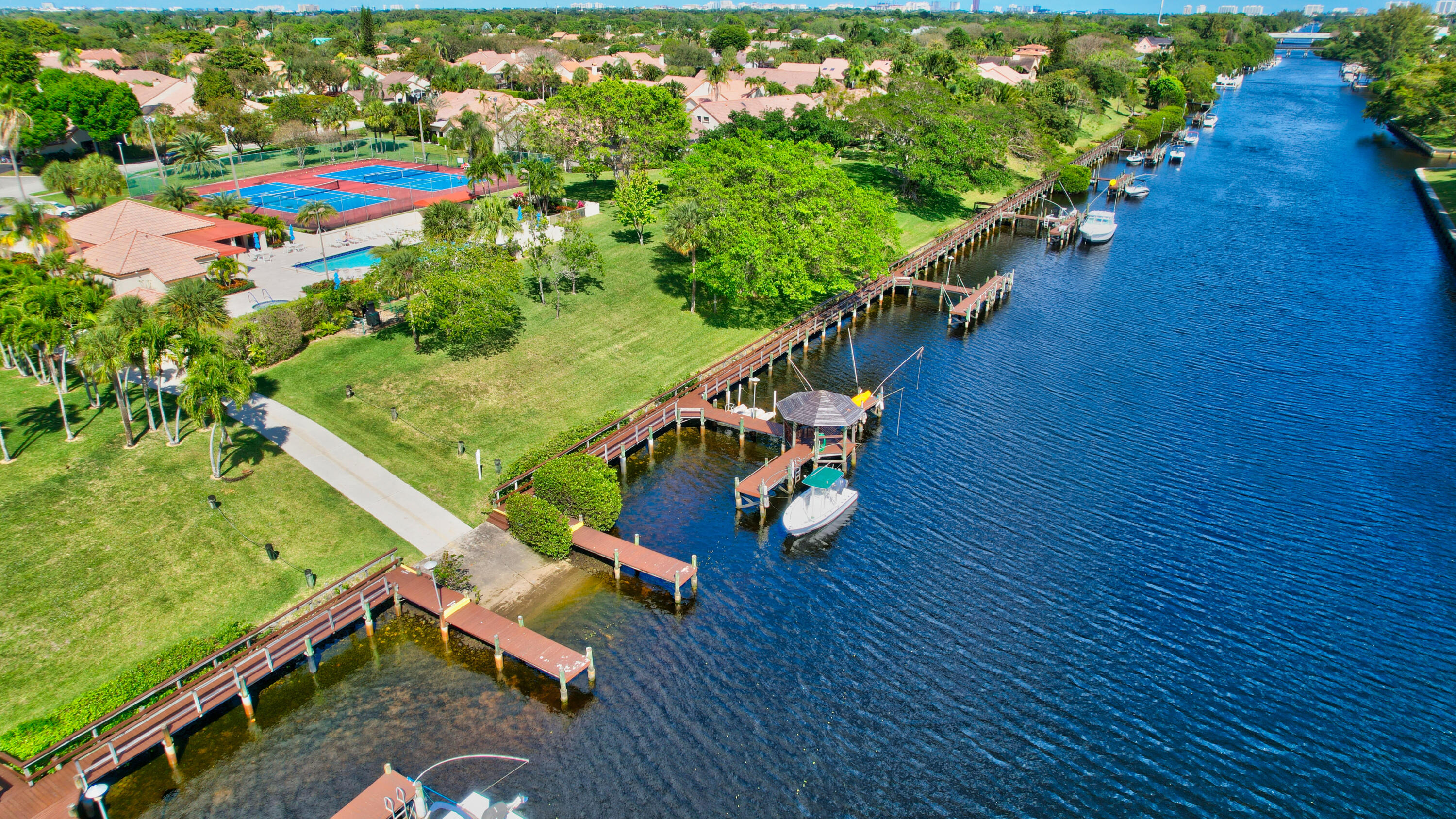 23271 Water Circle Boca Raton, FL 33486 - Photo 59 of 64 an aerial view of a house yard swimming pool and outdoor seating