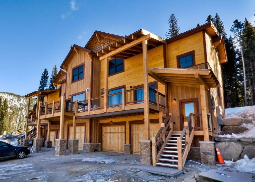 742 Independence Road, Unit 3B Keystone, CO 80435 - Photo 1 of 25 a front view of a residential apartment building with a yard