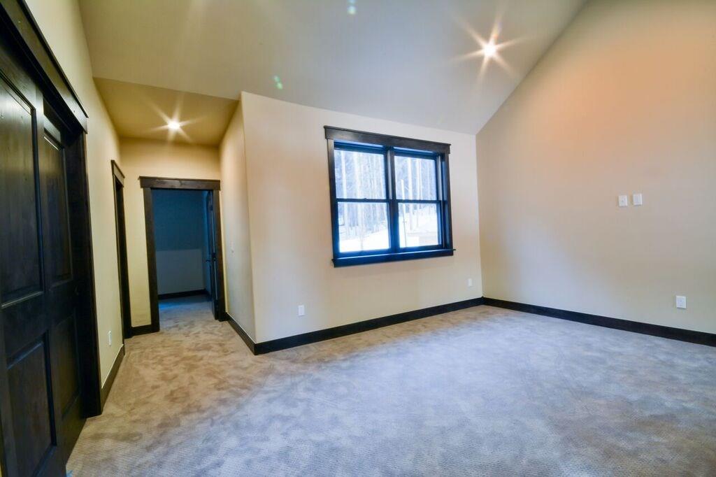 742 Independence Road, Unit 3B Keystone, CO 80435 - Photo 17 of 25 an empty room with entrance and windows