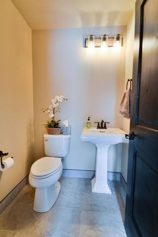 742 Independence Road, Unit 3B Keystone, CO 80435 - Photo 24 of 25 a bathroom with a sink toilet and a mirror