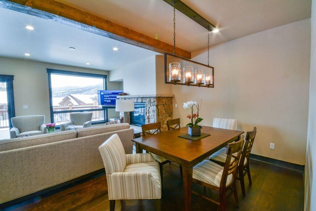 742 Independence Road, Unit 3B Keystone, CO 80435 - Photo 4 of 25 a dining room with furniture and a chandelier