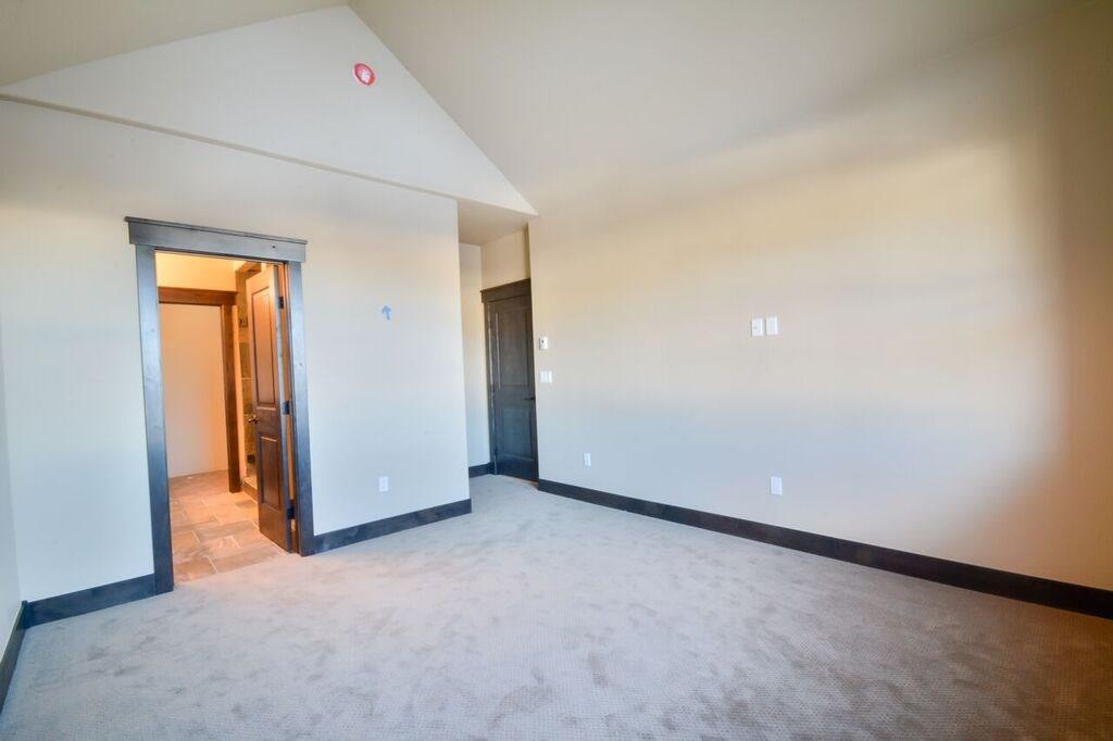 742 Independence Road, Unit 3B Keystone, CO 80435 - Photo 10 of 25 an empty room with closet and a bathroom
