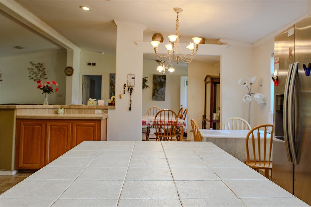 1468 Cedar Mills Road Gordonville, TX 76245 - Photo 14 of 35 a spacious bathroom with a double vanity sink and a mirror