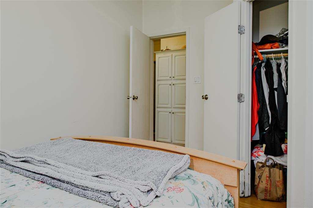 1468 Cedar Mills Road Gordonville, TX 76245 - Photo 26 of 35 a bedroom with a bed and a closet