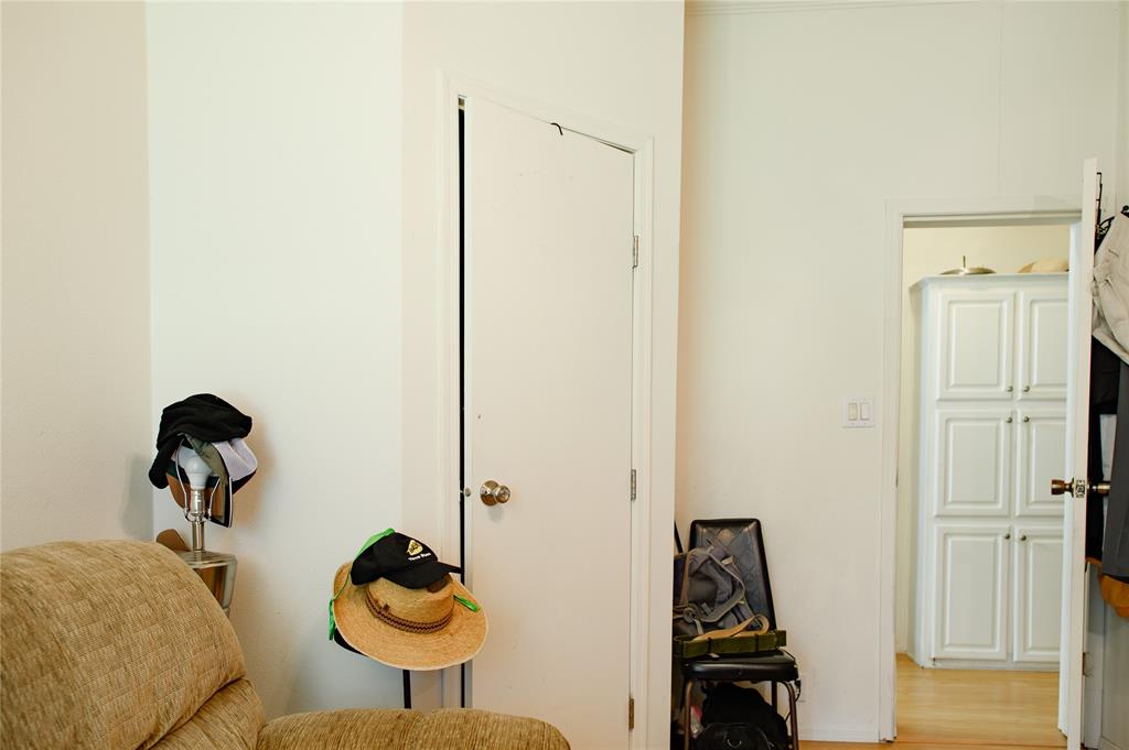 1468 Cedar Mills Road Gordonville, TX 76245 - Photo 28 of 35 a living room with furniture and a closet