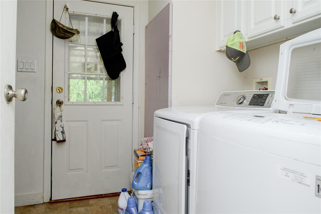 1468 Cedar Mills Road Gordonville, TX 76245 - Photo 29 of 35 a bathroom with a sink and a window