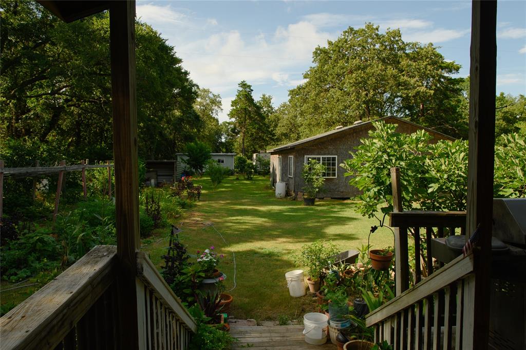 1468 Cedar Mills Road Gordonville, TX 76245 - Photo 30 of 35 a view of a small yard from a balcony