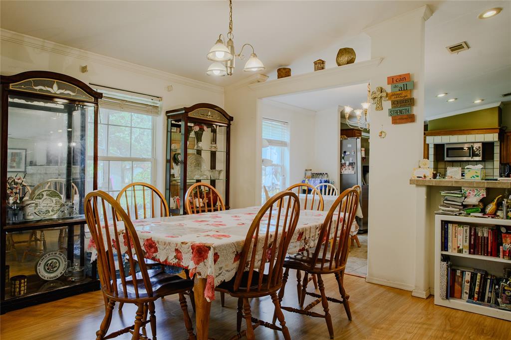 1468 Cedar Mills Road Gordonville, TX 76245 - Photo 6 of 35 a dining room with furniture and window