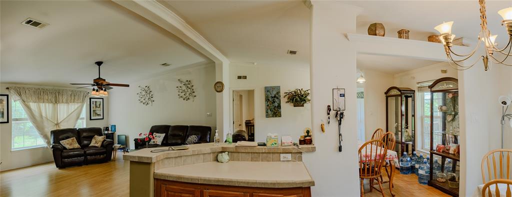 1468 Cedar Mills Road Gordonville, TX 76245 - Photo 10 of 35 a living room with furniture and a flat screen tv