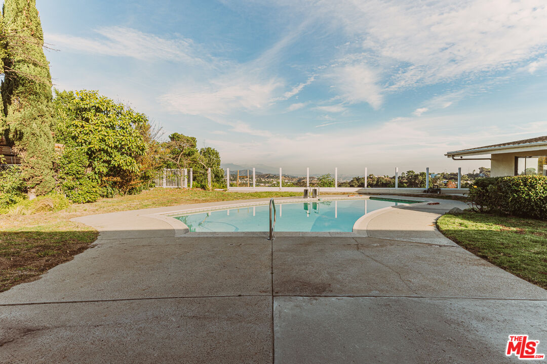 1950 Carla Ridge Beverly Hills, CA 90210 - Photo 20 of 29 a view of a yard