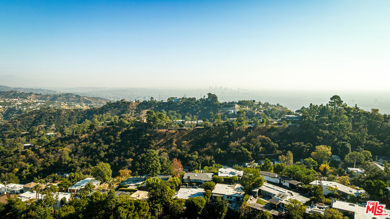 1950 Carla Ridge Beverly Hills, CA 90210 - Photo 27 of 29 an aerial view of multiple house