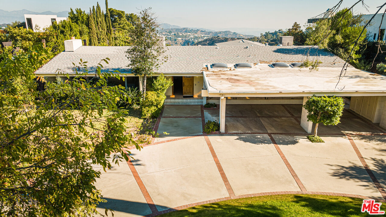 1950 Carla Ridge Beverly Hills, CA 90210 - Photo 5 of 29 a view of a terrace