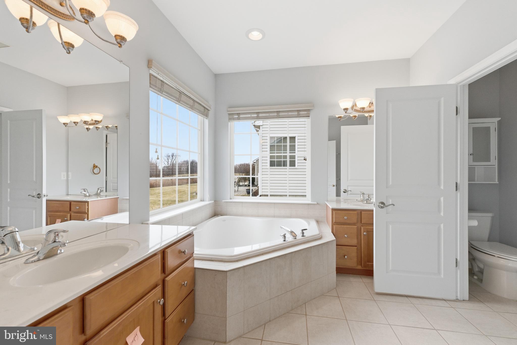 67 Pennington Court Delanco, NJ 08075 - Photo 20 of 35 a spacious bathroom with a tub sink and mirror