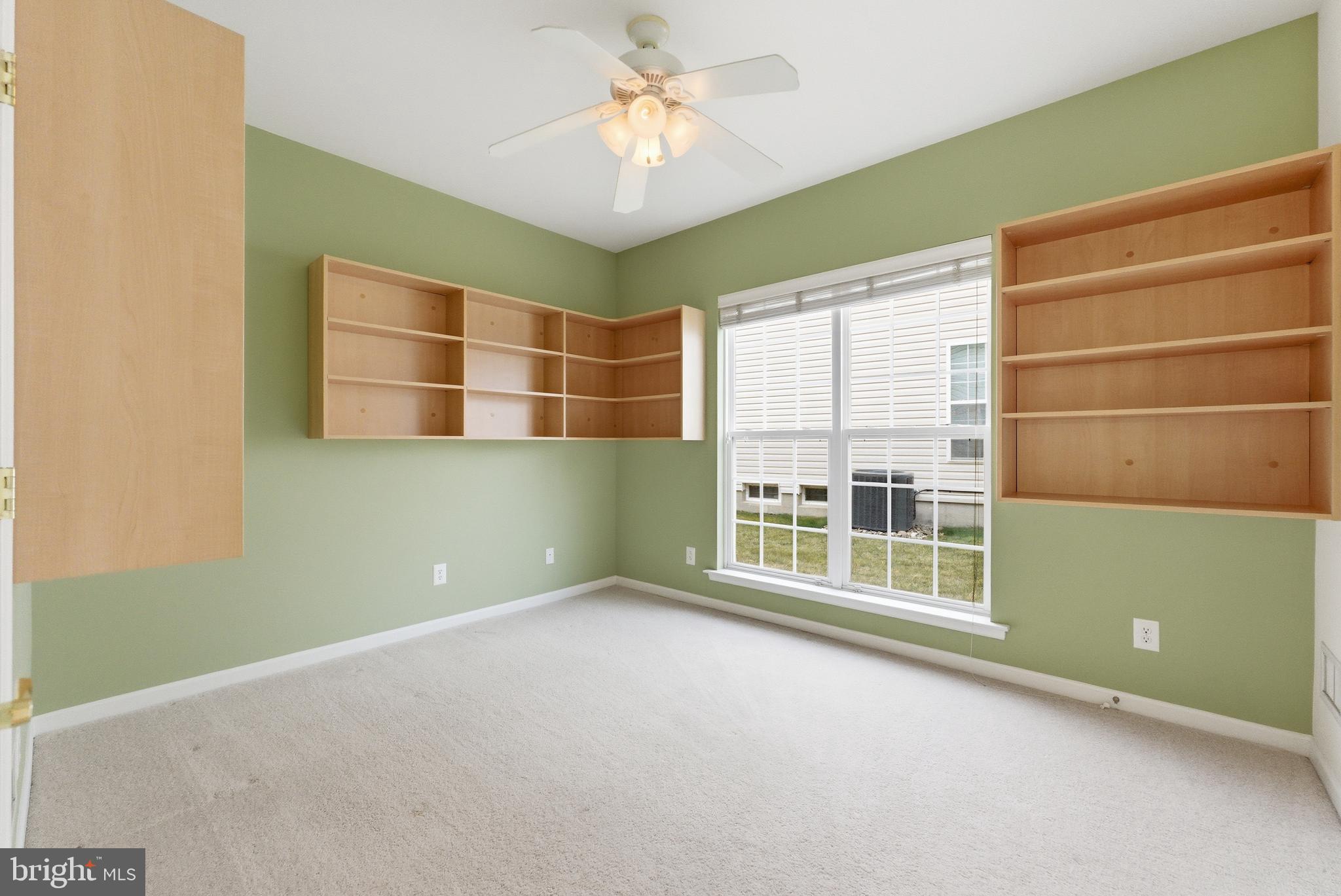 67 Pennington Court Delanco, NJ 08075 - Photo 23 of 35 a view of an empty room with a window and a fan