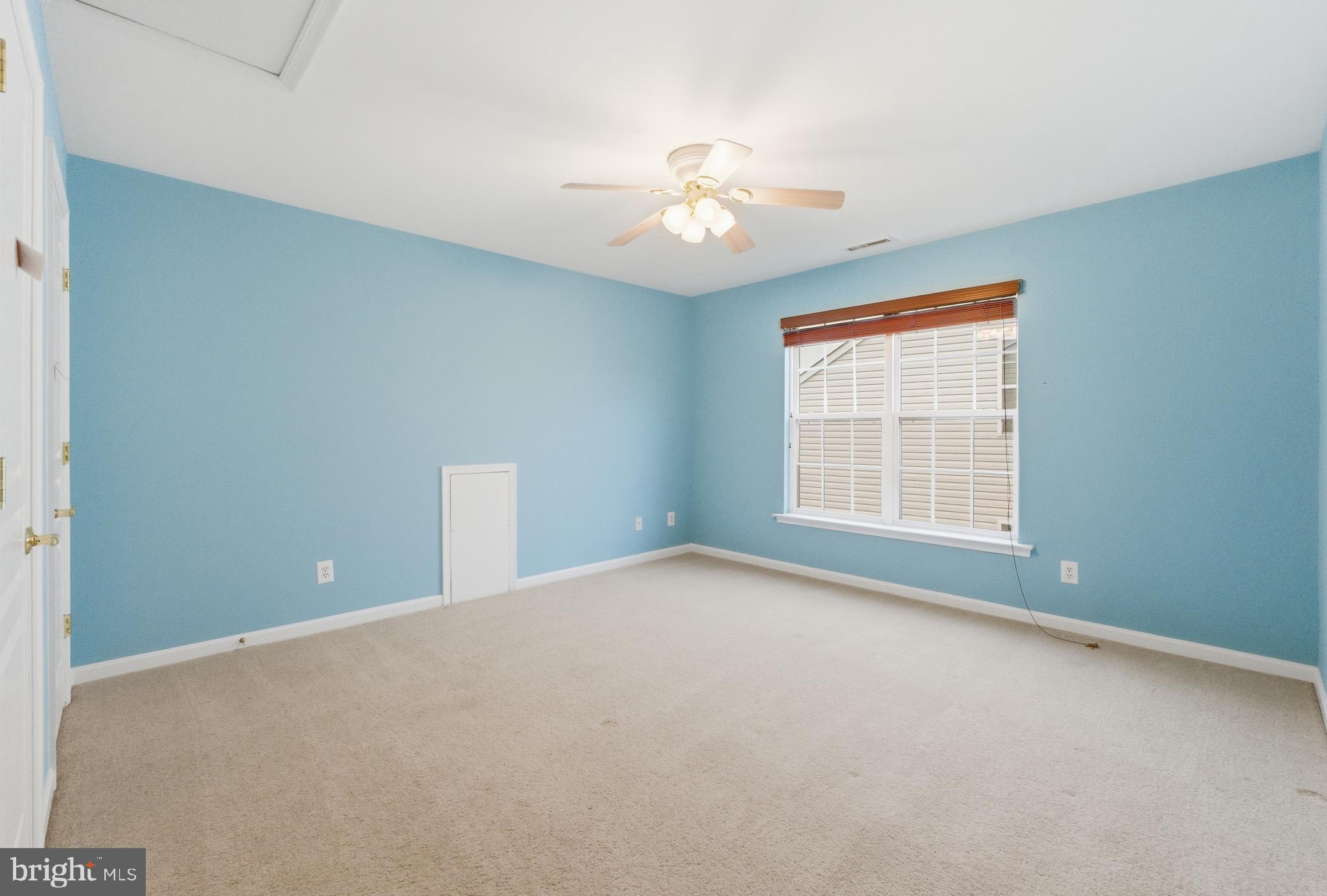67 Pennington Court Delanco, NJ 08075 - Photo 30 of 35 an empty room with chandelier fan and windows