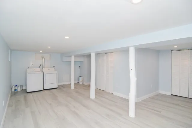 a view of a livingroom with wooden floor