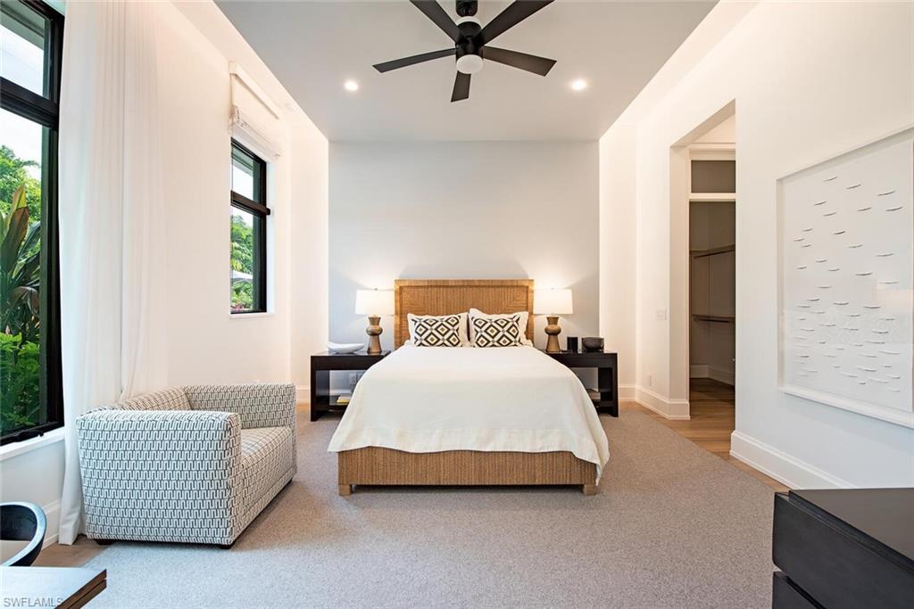 1300 Nautilus Road Naples, FL 34102 - Photo 18 of 21 a bedroom with a bed and window