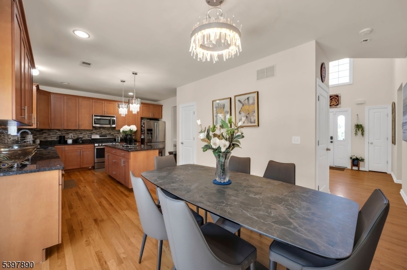 6 Jacob Way Phillipsburg, NJ 08865 - Photo 15 of 34 a kitchen with granite countertop kitchen island dining table and stainless steel appliances