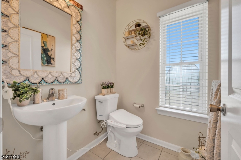 6 Jacob Way Phillipsburg, NJ 08865 - Photo 18 of 34 a bathroom with a sink mirror toilet and next to a window