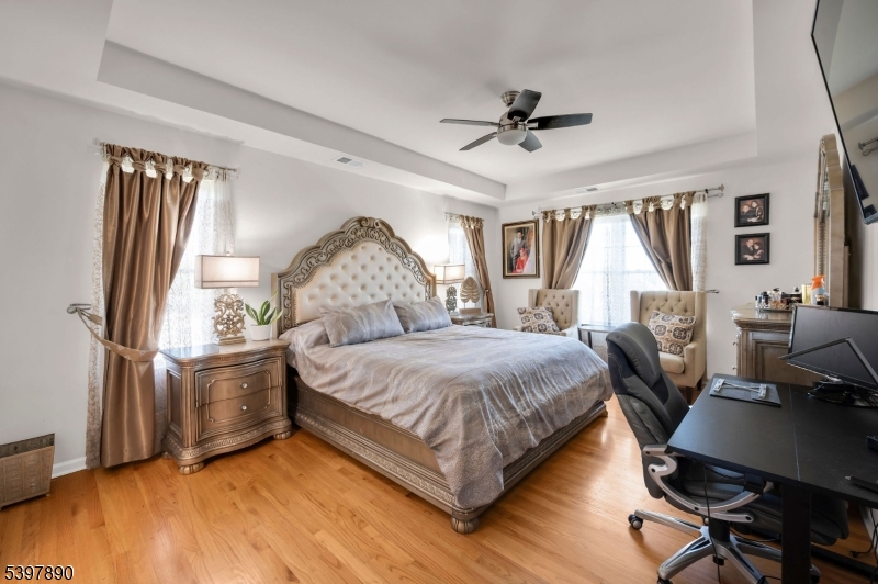 6 Jacob Way Phillipsburg, NJ 08865 - Photo 20 of 34 a bedroom with a bed wooden floor and window