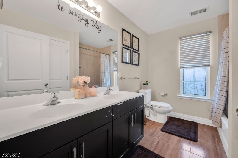 6 Jacob Way Phillipsburg, NJ 08865 - Photo 31 of 34 a bathroom with a sink toilet and a mirror