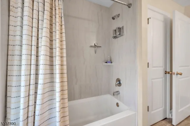 a bathroom with a bathtub