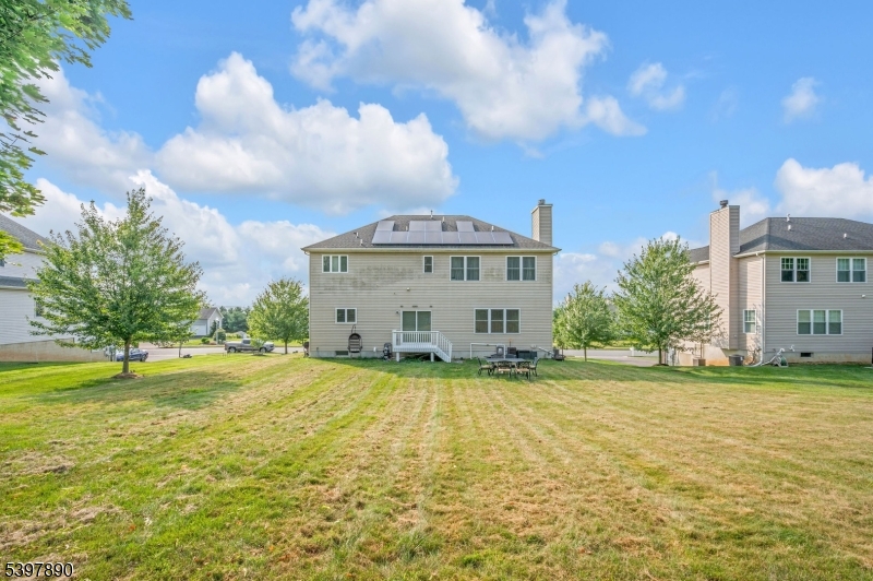 6 Jacob Way Phillipsburg, NJ 08865 - Photo 5 of 34 a view of a big yard with a house in the background