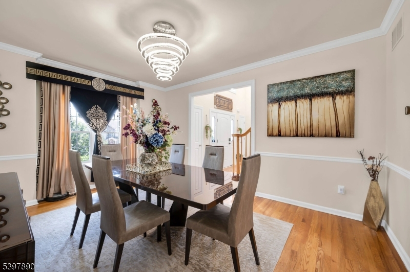 6 Jacob Way Phillipsburg, NJ 08865 - Photo 9 of 34 a view of a dining room with furniture and chandelier