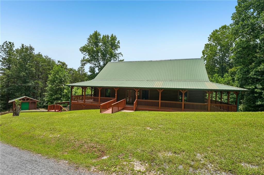 1384 Crystal Lane Northeast Ranger, GA 30734 - Photo 5 of 89 a view of a house with a yard