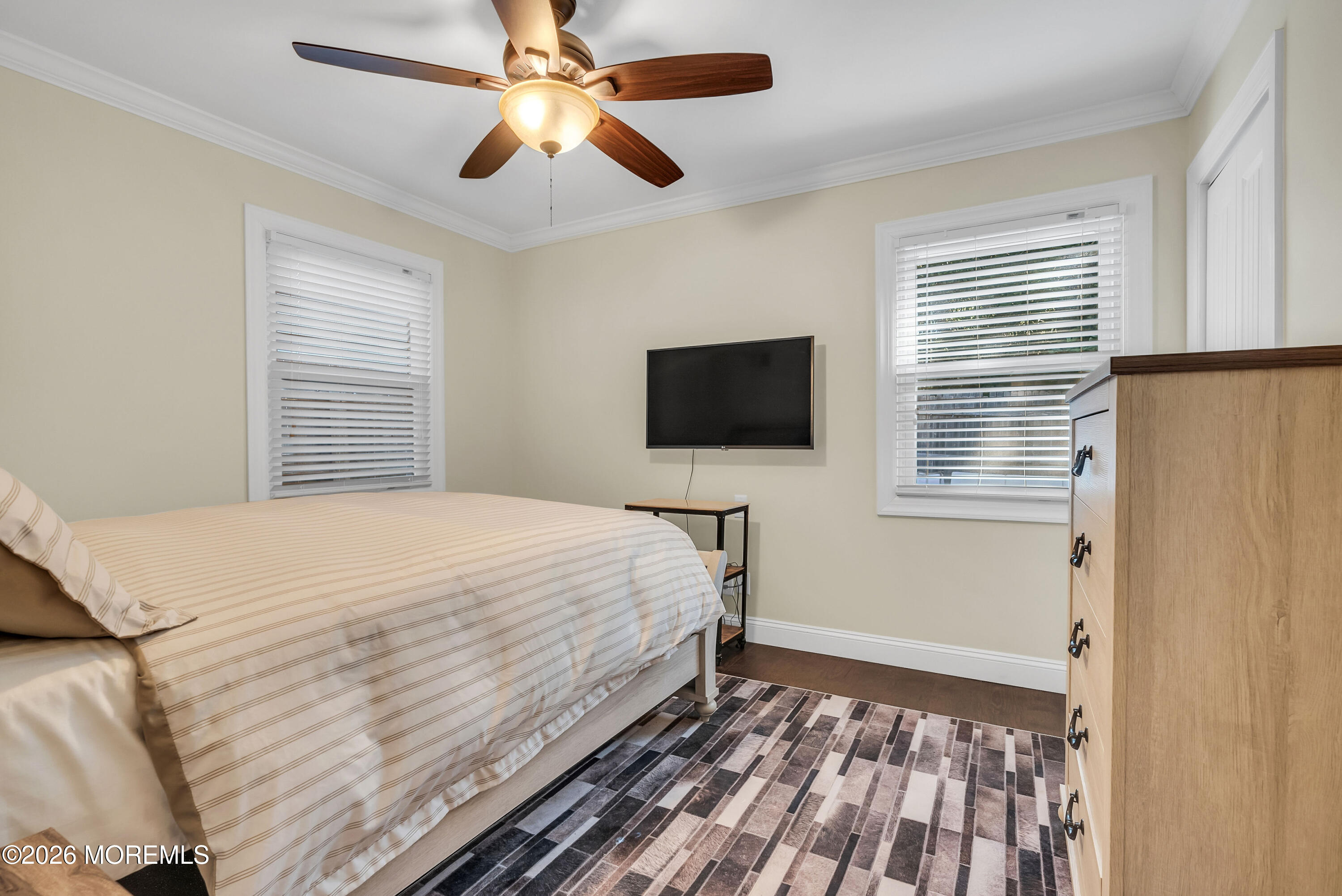 187 Pinecrest Road Oakhurst, NJ 07755 - Photo 20 of 26 a bedroom with a bed and a flat screen tv