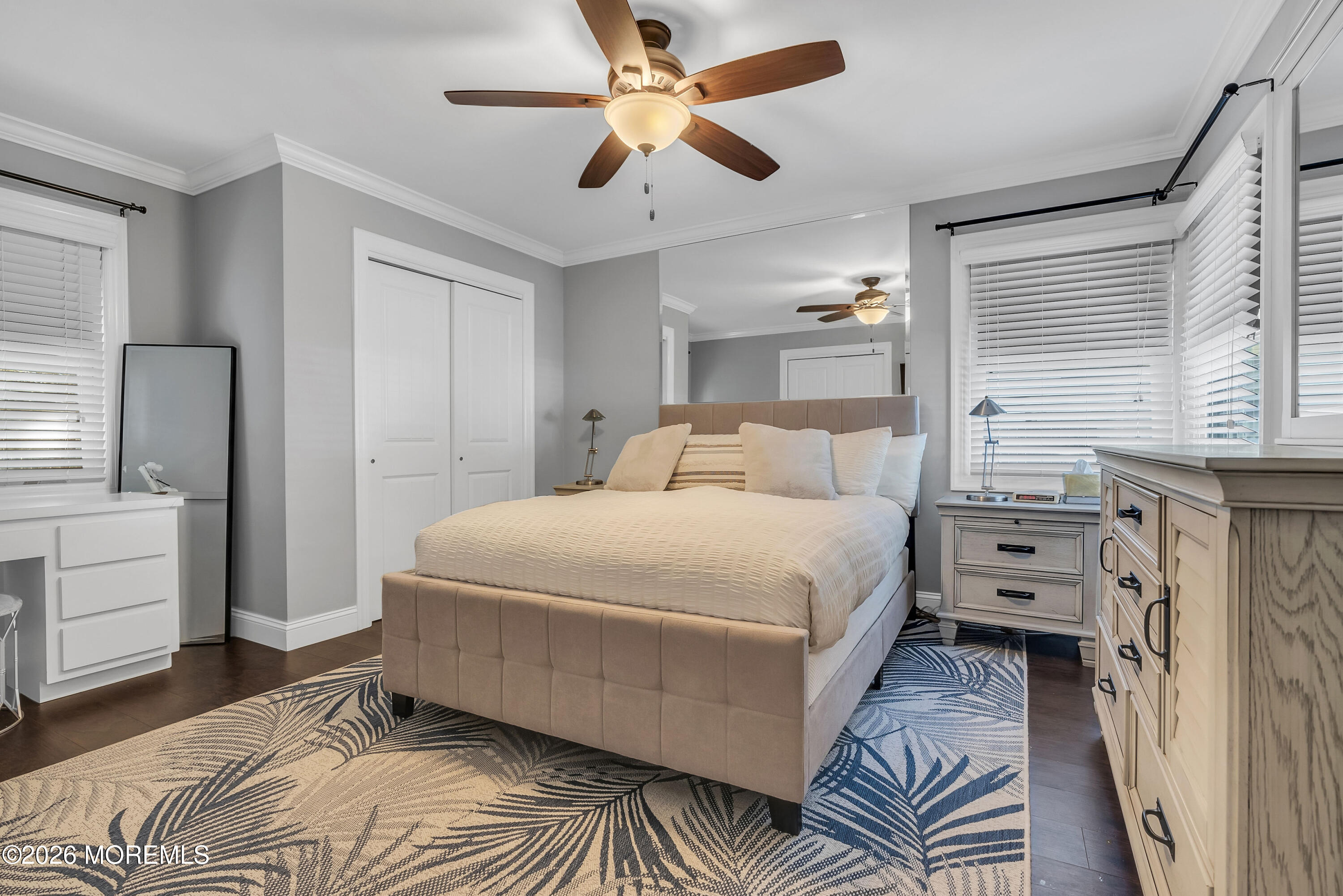 187 Pinecrest Road Oakhurst, NJ 07755 - Photo 21 of 26 a bedroom with a large bed and a window