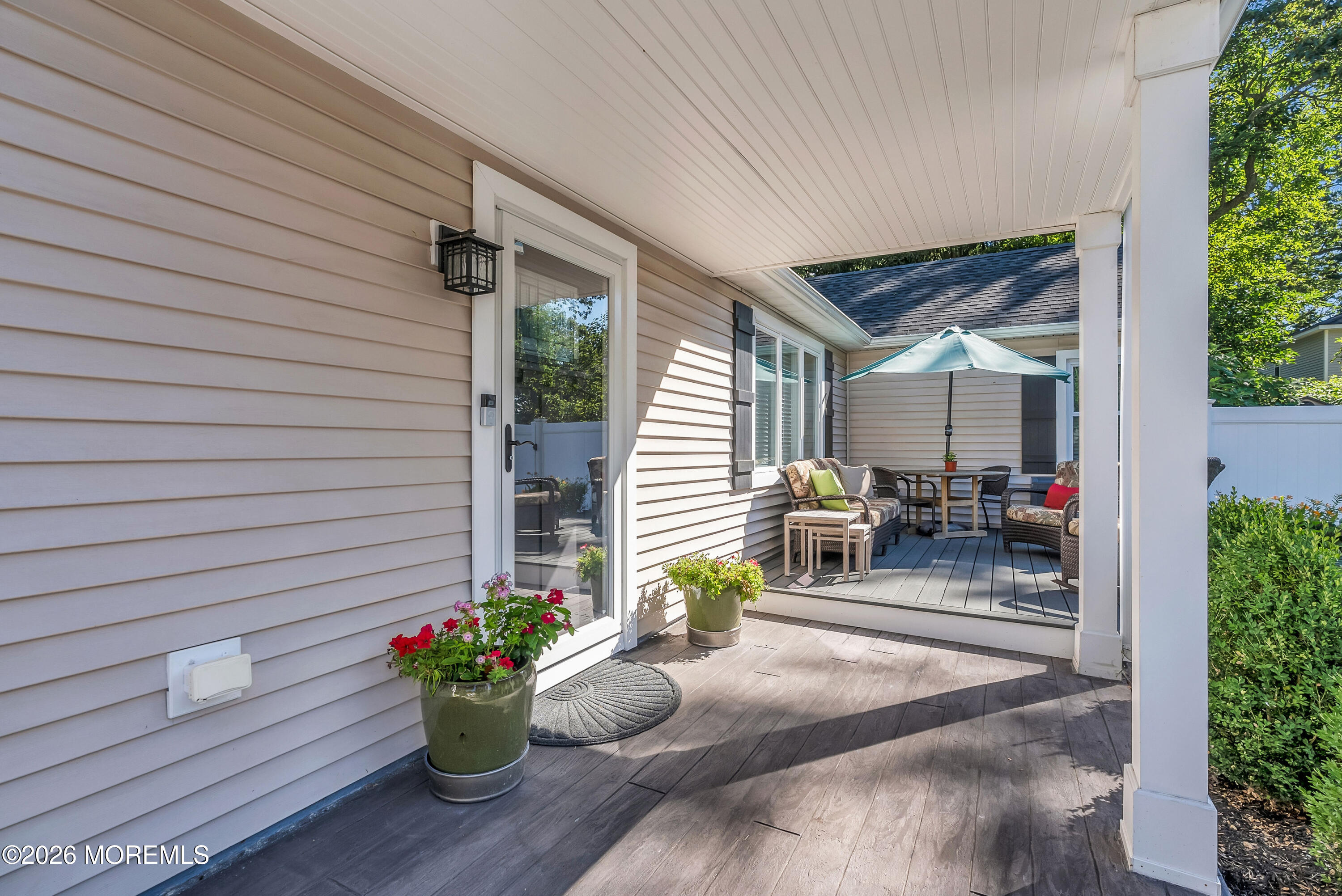 187 Pinecrest Road Oakhurst, NJ 07755 - Photo 3 of 26 a lobby with furniture and flowers