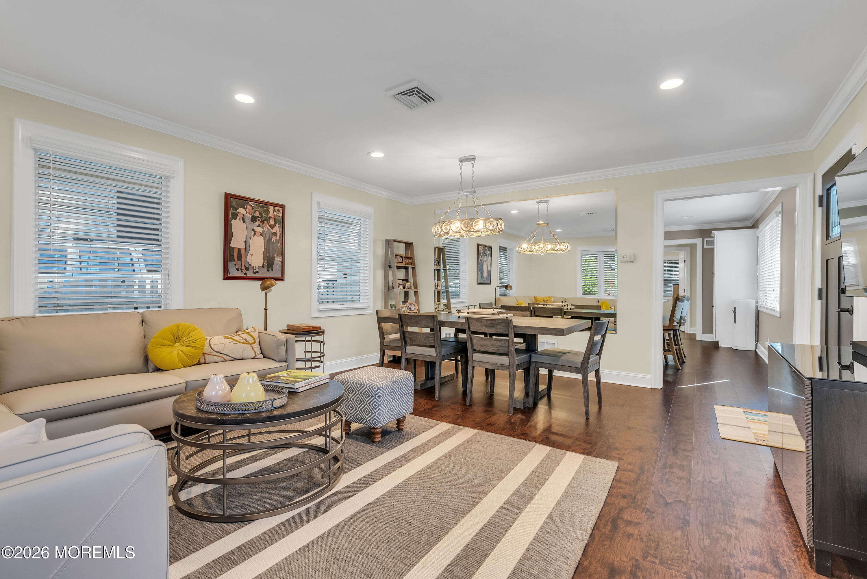 187 Pinecrest Road Oakhurst, NJ 07755 - Photo 10 of 26 a living room with furniture and a table