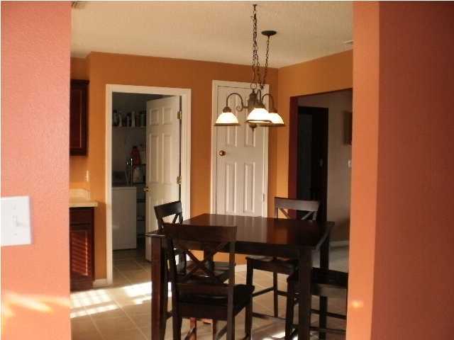 267 Limestone Circle Crestview, FL 32539 - Photo 5 of 9 a view of a dining room with furniture and chandelier