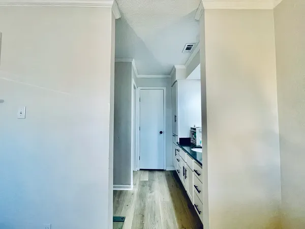 a bed room with a bed and table