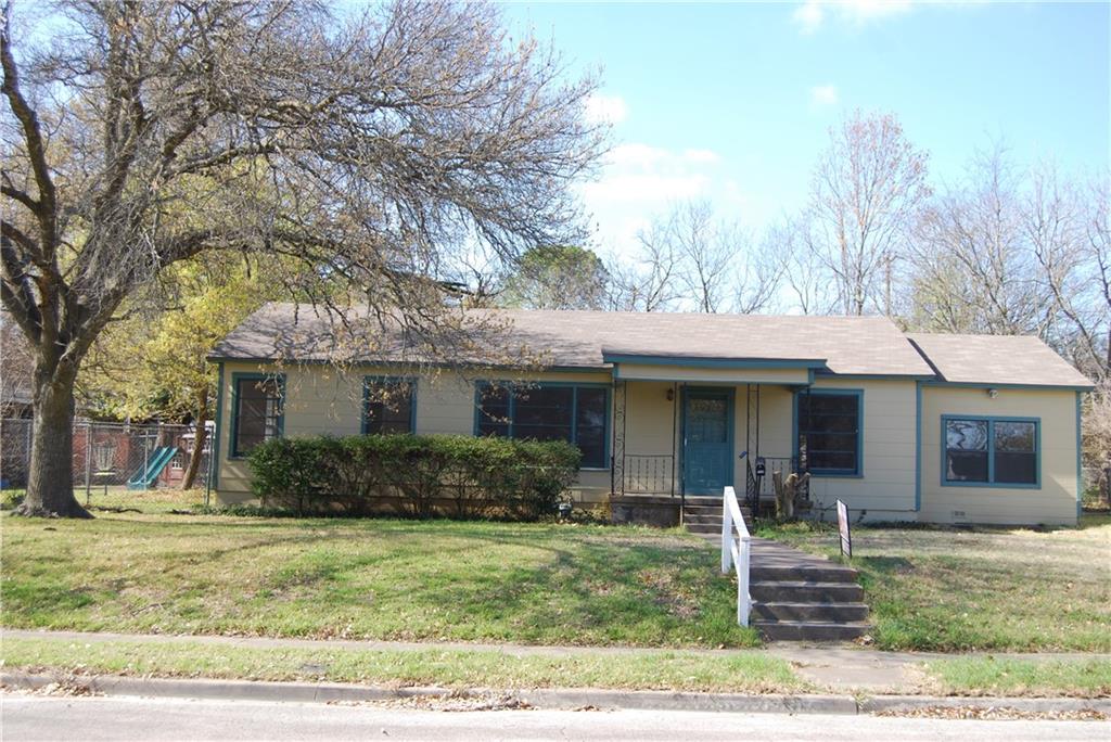 1208 Sunset Street Waco, TX 76710 - Photo 1 of 1 a front view of a house with garden
