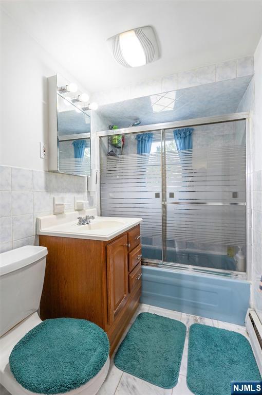 34 Lakeview Avenue Butler, NJ 07405 - Photo 12 of 30 a bathroom with a sink toilet and shower