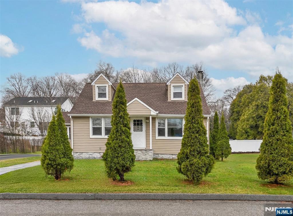 34 Lakeview Avenue Butler, NJ 07405 - Photo 26 of 30 a front view of a house with a yard