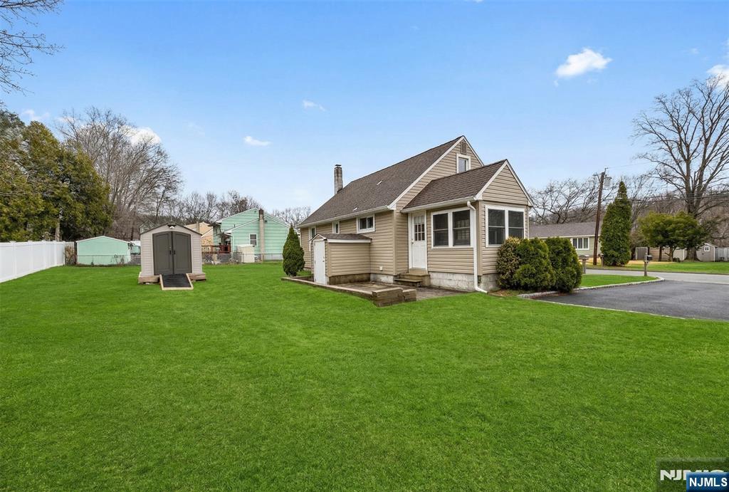 34 Lakeview Avenue Butler, NJ 07405 - Photo 28 of 30 a front view of a house with garden