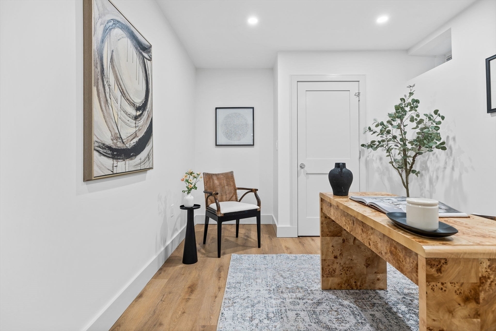 54 Springfield Street, Unit 1 Somerville, MA 02143 - Photo 25 of 38 a view of a livingroom with furniture and front door